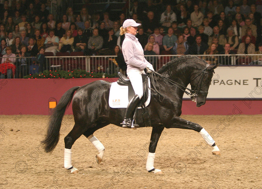 385 8539. 
 Anky Van Grunsvan NED riding Silvano 
 Keywords: InternationalDressage, Dressage, horses, competition, equine, sport,