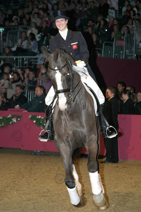 388 8823b 
 Laura Bechtolheimer riding Douglas Dorsey 
 Keywords: InternationalDressage, Dressage, horses, competition, equine, sport,