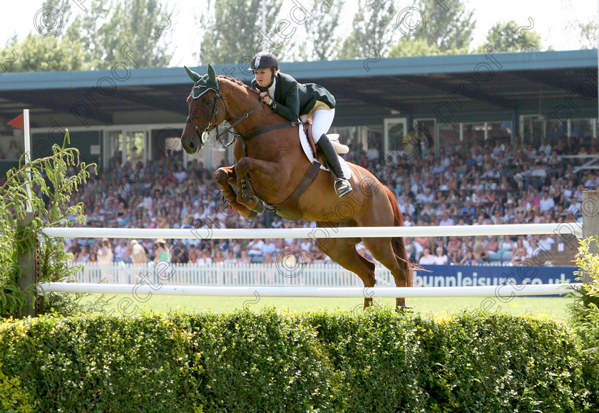 457 5708 
 Sarah Quinlivan riding Newmarket Girl 
 Keywords: International Show Jumping, horses, equine, Hickstead, showjumping, sport, horse competition