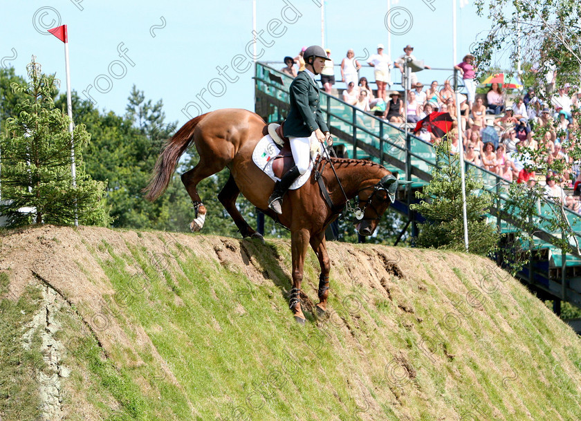 457 5710.JcropPG 
 Sarah Quinlivan riding Newmarket Girl 
 Keywords: International Show Jumping, horses, equine, Hickstead, showjumping, sport, horse competition