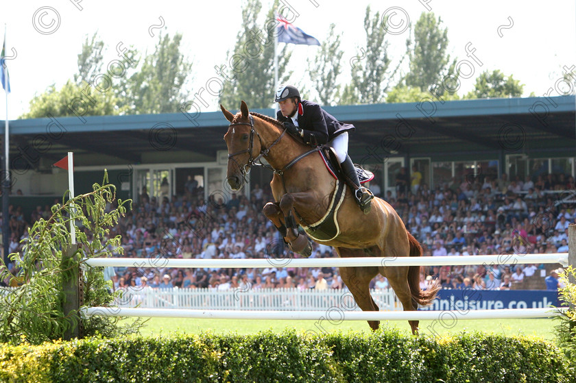 457 5701crop 
 David McPherson riding Bob's Diamond 
 Keywords: International Show Jumping, horses, equine, Hickstead, showjumping, sport, horse competition